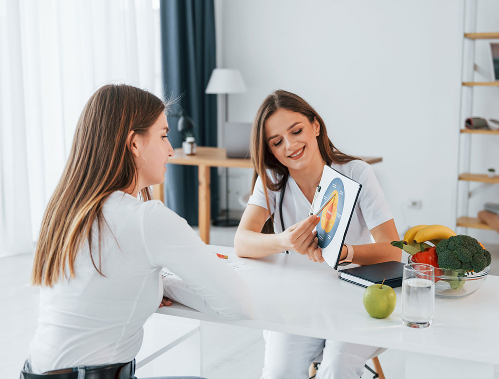 woman-showing-illustration-to-the-female-customer-resize.jpg woman-showing-illustration-to-the-female-customer-resize.jpg