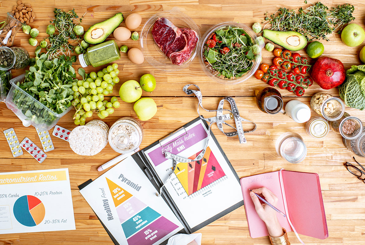 writing-a-diet-plan-on-the-table-full-of-healthy-resize.jpg writing-a-diet-plan-on-the-table-full-of-healthy-resize.jpg